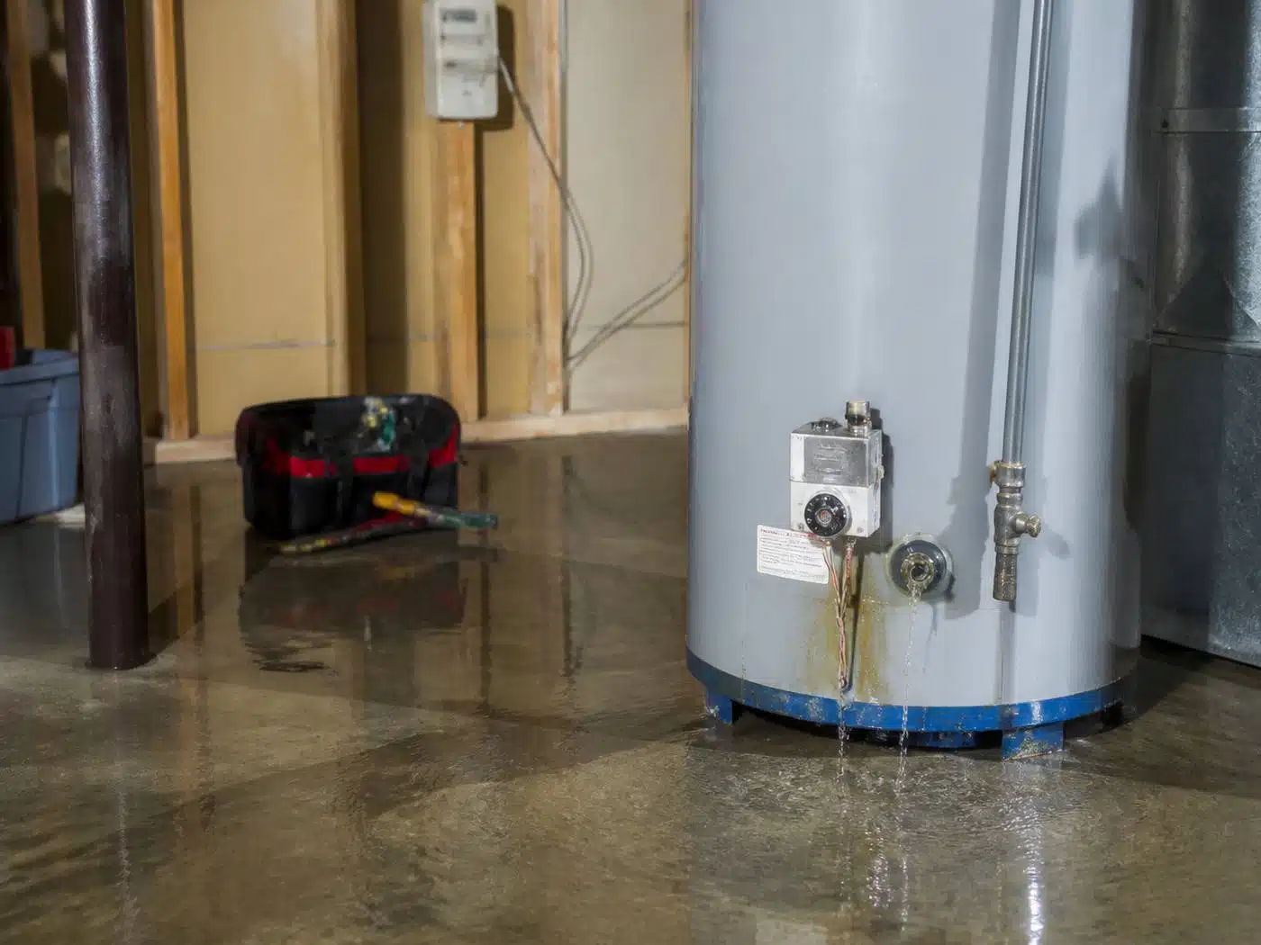 Wider view of the work area, failed water heater leaking in a Denver metro basement