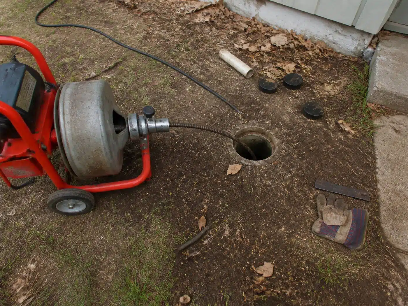 Wider view of the work area, rooter cabling machine clearing a Denver metro main line